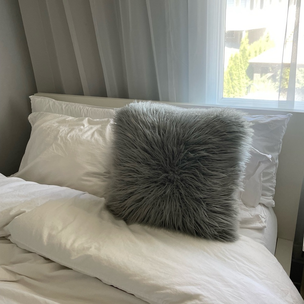 Grey fluffy pillow